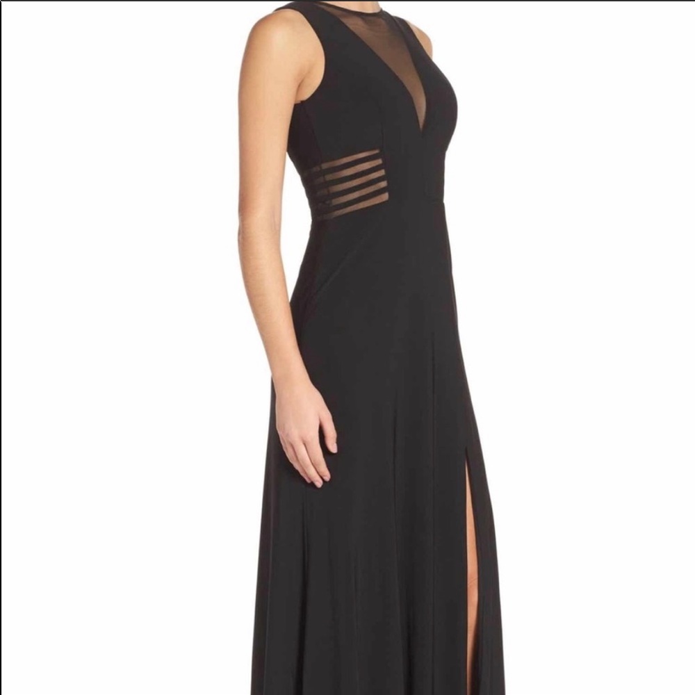 Black formal/prom dress. Slimming with mesh cutout